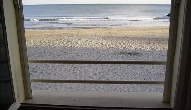 Exceptional setting across from the sea with private access to the beach