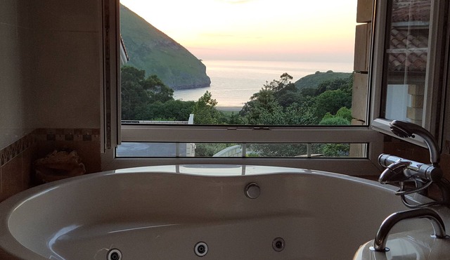 Exclusive apartment in beach Sonabia with a view to the sea and the mountain.