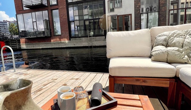 Exclusive canal house directly on the water with private floating terrace