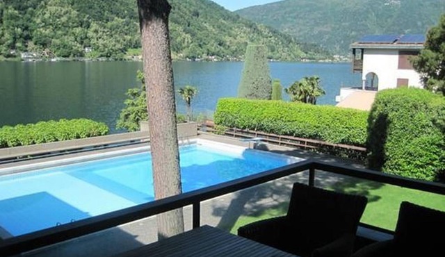 Exclusive flat, on Lake Lugano, with outdoor pool