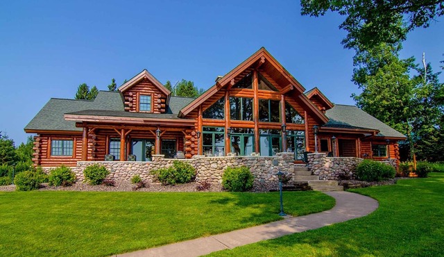 Exclusive Home On Chippewa Flowage- 3.6 acres with sand beach and two Private docks