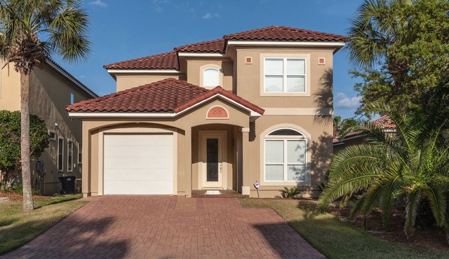 Exclusive private home in gated community across the street from the beach.