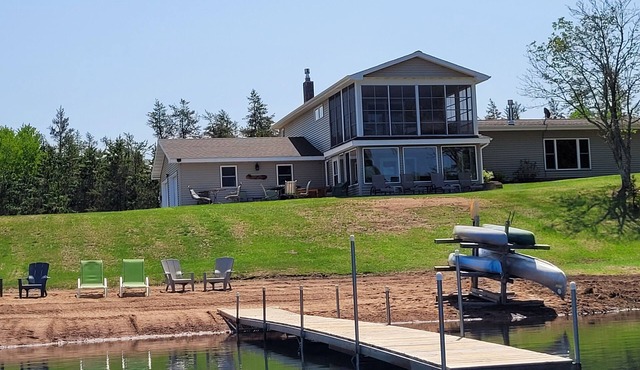 Exclusive Retreat! Private Lake, River Frontage and 100's of Acres with Trails