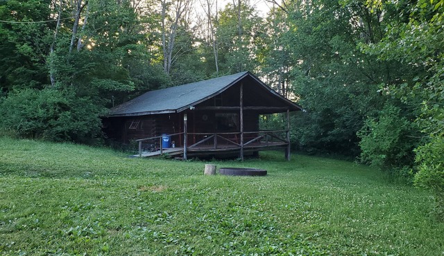 Exclusive Single Log Cabin By a fully stocked Lake