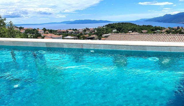 Exclusive vacation apartment near Opatija with 180° sea view and private pool.