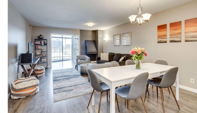 Executive 2BR condo with garage, gym, sauna, tennis court, & outdoor grilling