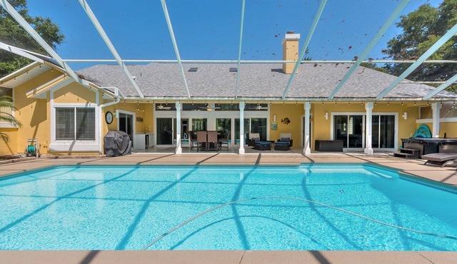 Executive 3-Bedroom Hangar Home within Spruce Creek Fly-In, live 24 hr security.