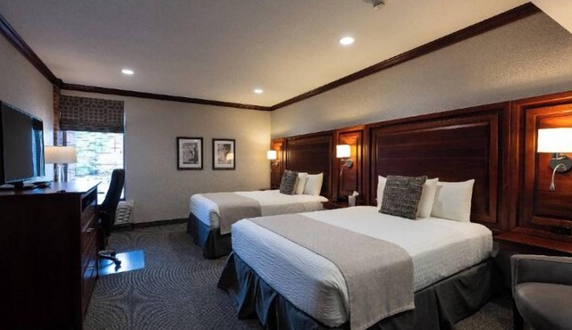 Executive Double Queen Room with Modern Amenities & Breakfast