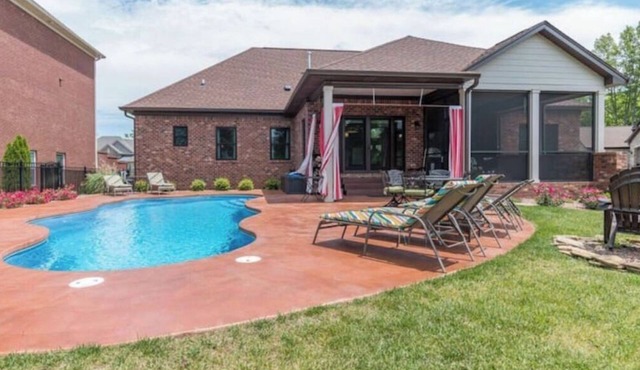 Executive East End Derby Home with Heated Pool