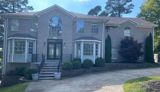 Executive Home- Conveniently Located w/ Outdoor Pool & 2 Master Suites