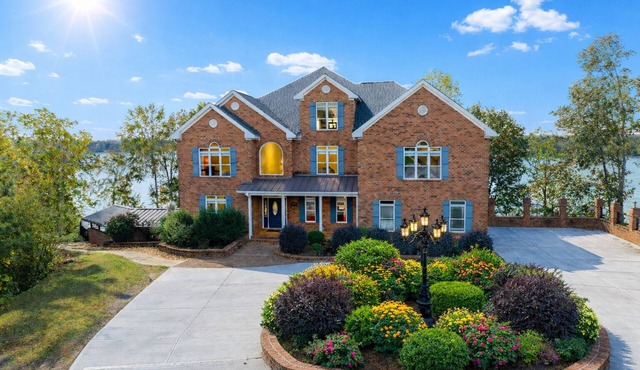 Executive Mansion at Lake Gaston sleeps 40 and has HEATED POOL.