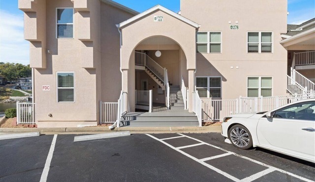 Expansive 3-bedroom condo offering breathtaking main channel views at Lake Ozark