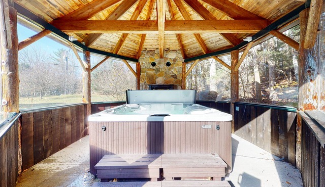 Expansive home with game room, hot tub, firepit, & fireplace - walk to town