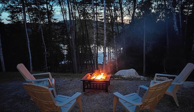 Expansive Lakefront modern retreat nestled by nature, huge windows ,4 bedroom