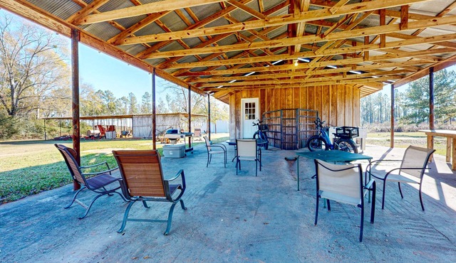 Expansive property with two homes, ponds, pool, game tables, & hiking trails