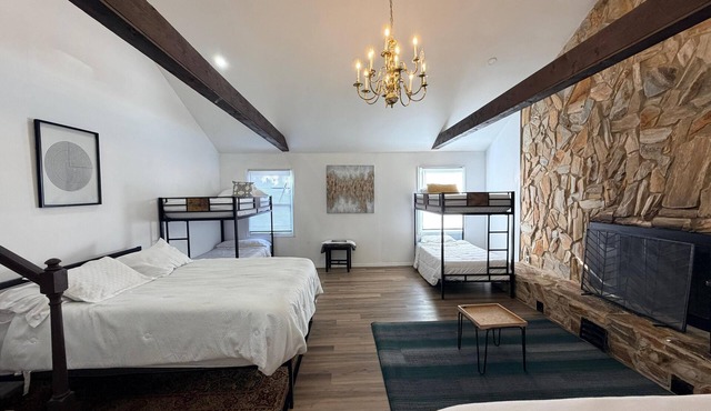 Experience a modern retreat with room for everyone! This 5-bedroom home offers a king suite, pool table, and fast Wi-Fi, making it ideal for family gatherings or group getaways