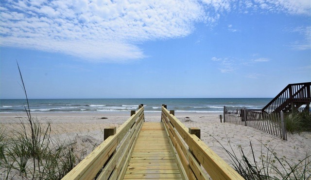 Experience beachside bliss at Almost Heaven North, a spacious 4-bedroom duplex in North Topsail!
