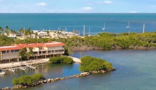 Experience coastal bliss at Oceanside Isle, a spacious 3-bedroom condo in Long Key.