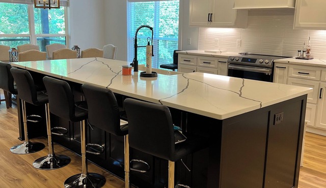 Experience Lake Tuscaloosa views from your 5-bedroom Northport retreat