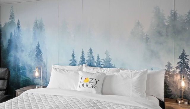 Experience luxury at Lazy Duck Inn #28 King Suite, just 1 minute from Yellowstone!