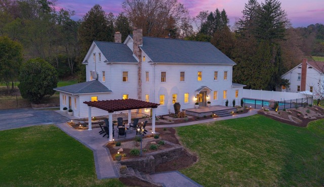 Experience luxury and relaxation at The Manor at Greene Hills Resort & Campground. This spacious retreat features 7 king bedrooms, cozy bunk rooms, a fully equipped chef’s kitchen, and elegant living spaces. Enjoy your private pool, hot tub, and saun