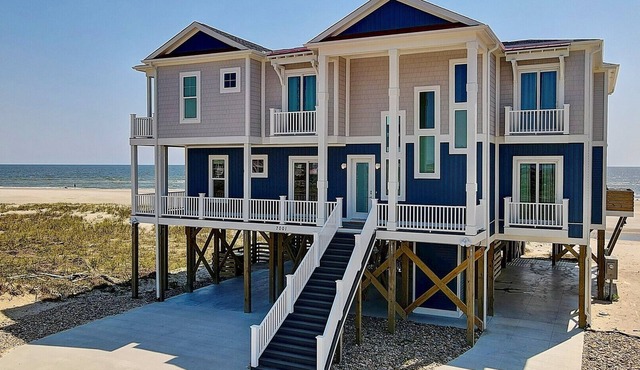 Experience luxury at Golden Gate, a stunning 10-bedroom oceanfront home in Oak Island!