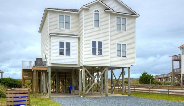Experience luxury at Apollo, an oceanfront house in Oak Island with 5 bedrooms.