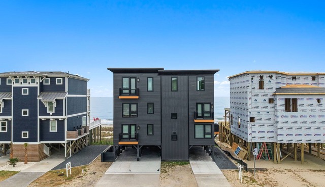 Experience luxury at the Black Pearl, an oceanfront home in Oak Island with 11 bedrooms.