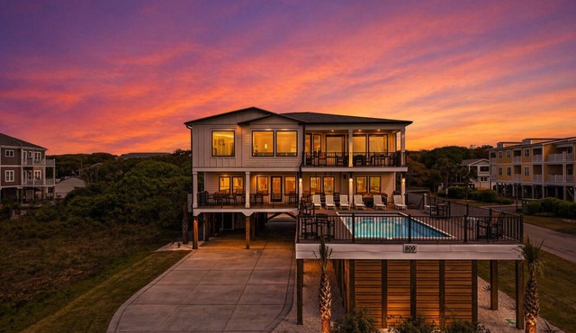 Experience luxury at Suite and Salty, an oceanview home in Oak Island with 10 bedrooms.