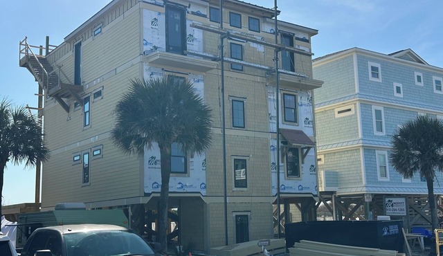 Experience luxury at 'How Suite It Is'—14-bedroom oceanfront retreat in Oak Island!