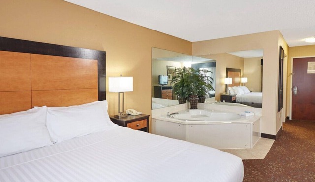 Experience Luxury in Suite W/ Whirlpool Tub!