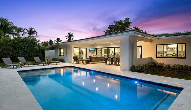 Experience Manatee Harbor, a Modern Heated Pool Getaway Near the Sand and Surf!