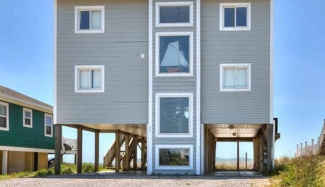 Experience oceanfront bliss at Therapy, a spacious 5BR house in Oak Island.