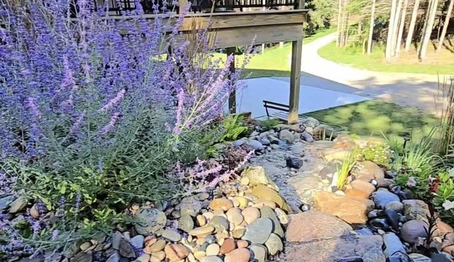 Experience panoramic views in ur 5-bed Frankfort retreat minute to Lake Michigan