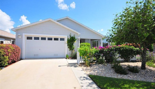 Experience the fun and excitement of The Villages in this beautiful Patio Villa.