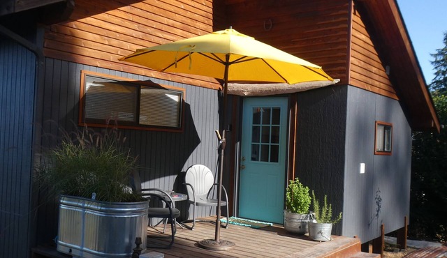 Experience the PNW in a cabin on Hood Canal with water and mountain views.