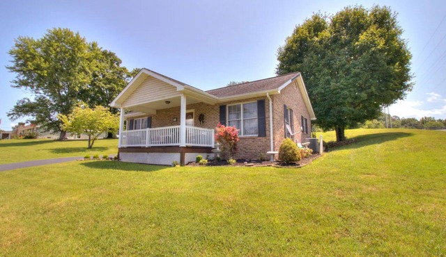 Experience the serenity of a peaceful neighborhood and the excitement of the city .