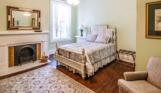Experience the vibrant Nelle May Room at the historic Litz Mansion in Tazewell, VA