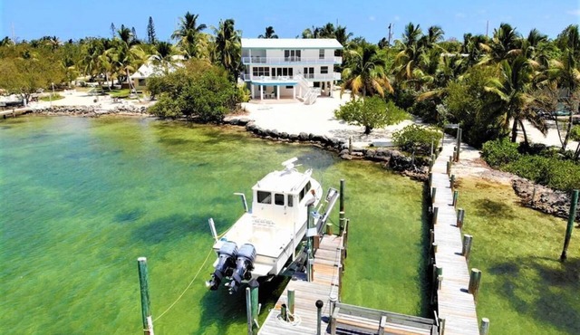 Experience waterfront living in this spacious 4-bedroom home in Islamorada.