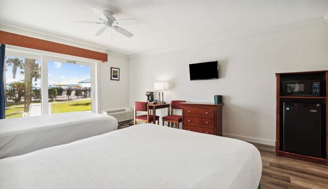 Explore Local Gems from a Relaxing Beachfront Room with Outdoor Swimming Pool