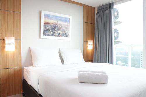 Exquisite 2BR Apartment at Taman Sari La Grande near BIP By Travelio