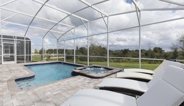 Exquisite 8BR Villa with Pool & Games | Champions Gate - 1509