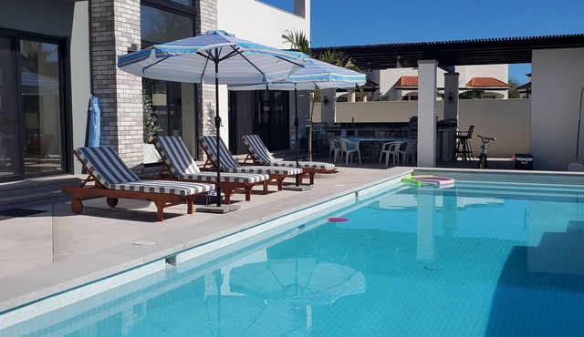 Exquisite Exclusive Elegant 4 Bdrm 6 bth heated pool moutain & golf course views