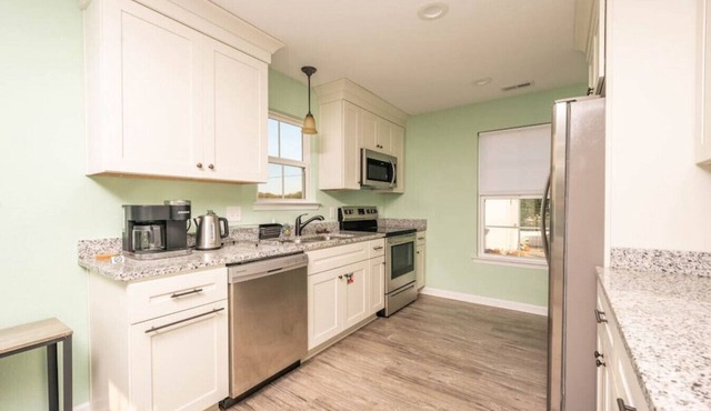 Extended Stay Ocean View 1BR | 1 Block to Beach | Free Tesla EV Charger