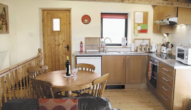 External stone steps to 1st floor entrance.