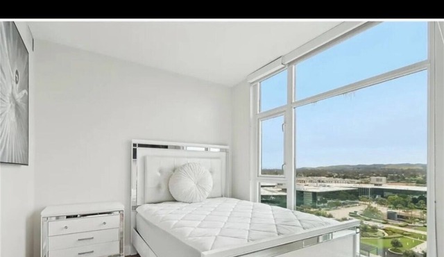 Extra luxurious high rise condo with panoramic views close to UCI and airport.