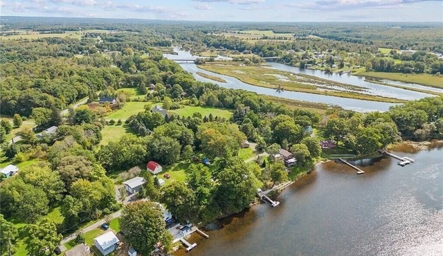 Fabulous 3-bedroom House on the salmon river with 126 feet of shoreline!