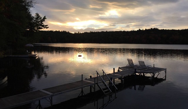 Fall colors at a Maine Lakefront cottage. Watch the beautiful change of seasons