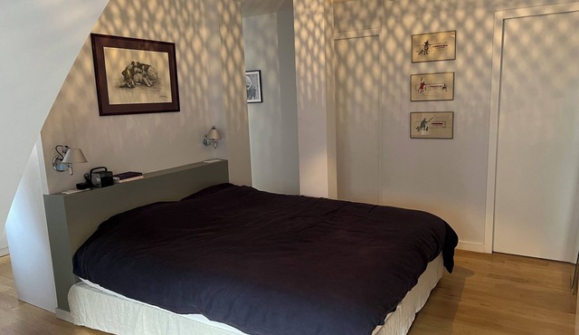 Family apartment -15 minutes from central Paris by metro