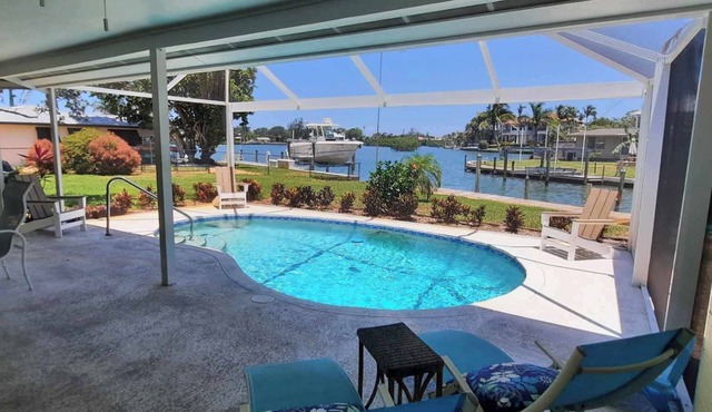 Family beach home! Renovated waterfront home with pool, dock, and nearby beach
